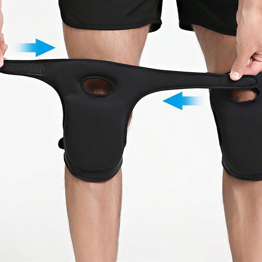 Adjusting the two straps of a black gardening knee pad around the leg